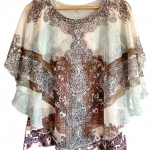 Cleo Multicolor Short Sleeve Top. Lined with a silky cotton like tank.